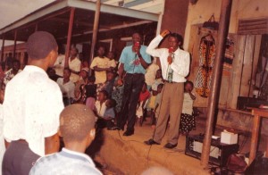 Elijah Preaching with his brother Pastor David Kyeyune in Busia Market, Uganda.